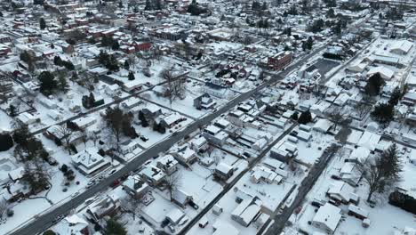 Aerial-of-white-USA-town-covered-in-snow