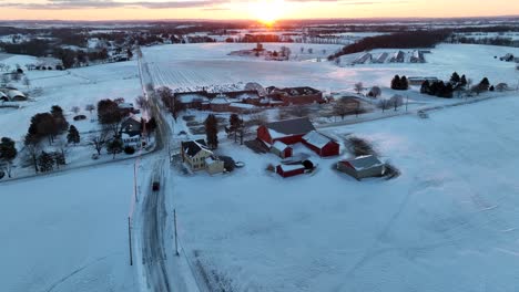 Rural-American-neighborhood-covered-in-winter-snow-at-sunrise