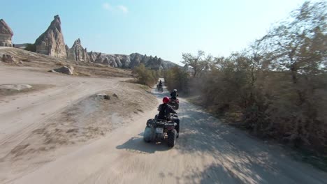 Travelers-On-Quad-Bike-Tour-In-Cappadocia,-Turkey