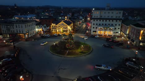 Christmas-decorations-lit-in-small-town-in-USA-at-dusk