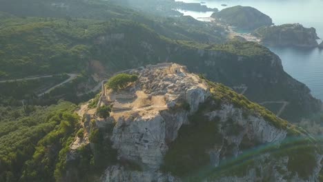 Angelokastro-fort-and-stunning-views-of-Corfu-Ionian-coastline-DRONE-ORBITAL