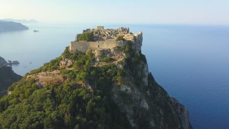 Angelokastro-Greek-hilltop-castle-spectacular-landmark-Corfu-AERIAL-ORBITAL