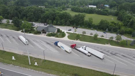 Aerial-view-of-truckers-rest-stop-near-the-highway-in-Ann-Arbor,-Michigan,-USA