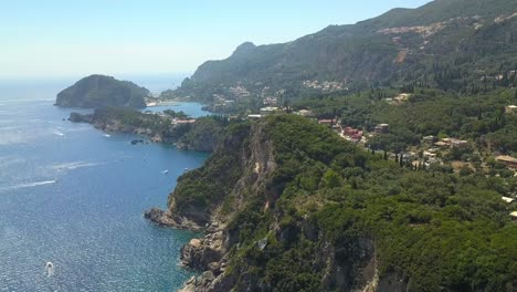 Drone-flyover-beautiful-rugged-Corfu-island-coastline-holiday-destination