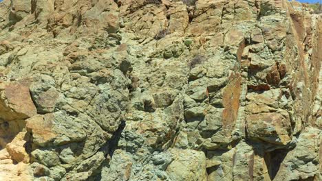 Rocky-cliff-on-hot-summer-day-in-Teide-national-park,-motion-view
