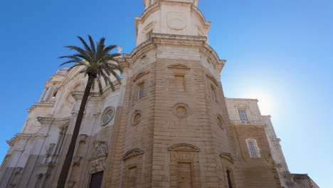 Imposing-cathedral-facade-against-blue-sky-in-Cadiz