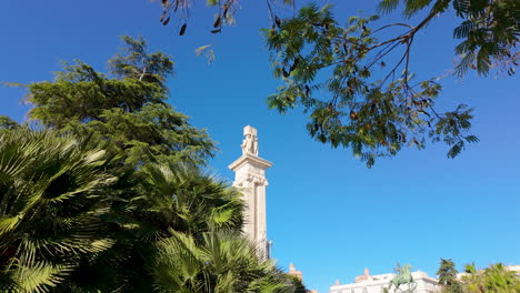 Historical-statue-towers-above-lush-greenery---Monumento-a-la-Constitución-de-1812