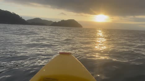 A-drifting-kayak-at-sunset