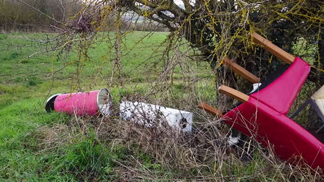 Illegal-fly-tipping-of-office-furniture-and-equipment-at-the-side-of-an-English-rural-road
