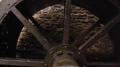 Close-up-on-a-wooden-water-wheel-from-a-water-mill
