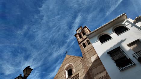 Light-clouds-passing-over-Spanish-clock-tower-Time-Lapse