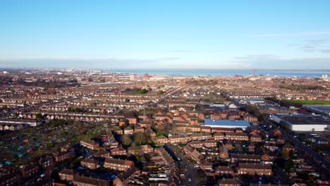 Wide-angle-drone-shot-panning-right-across-Grimsby-skyline-in-England