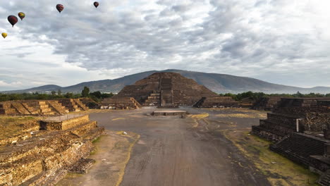 Drone-shot-toward-the-Pyramid-of-the-moon,-golden-hour-in-Teotihuacan,-Mexico