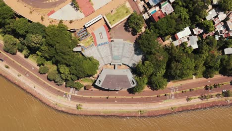 Top-down-image-of-the-Manuel-Antonio-Ramirez-Amphitheater-in-Posadas,-Misiones,-Argentina,-showcasing-the-architectural-beauty-and-cultural-significance-from-a-bird's-eye-view