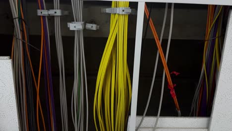 Bottom-up-shot-showing-modern-network-cabling-in-ceiling-of-modern-company,close-up-dolly
