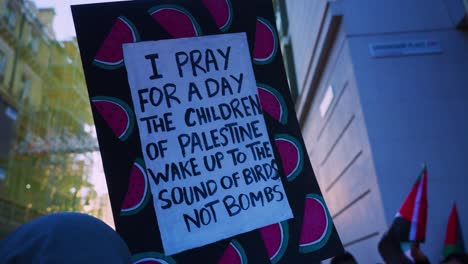 Anti-war-prayer-message-carried-at-political-demonstration-rally-for-Palestine