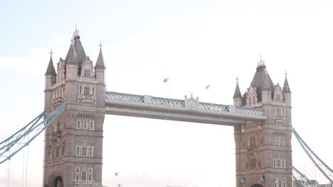 tower-bridge-spanning-the-thames-river-in-center-of-city-of-London,-United-Kingdom,-Britain