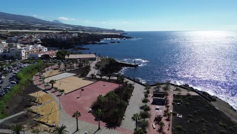 Aerial-coast-of-Tenerife-South-Canary-Islands,-coastal-town-Spain