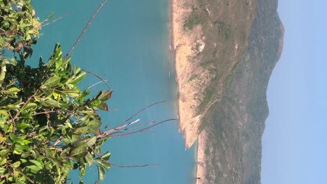 Vertical-footage-of-the-tropical-beach-hidden-away-in-the-San-Kung-East-Country-Park,-Hong-Kong