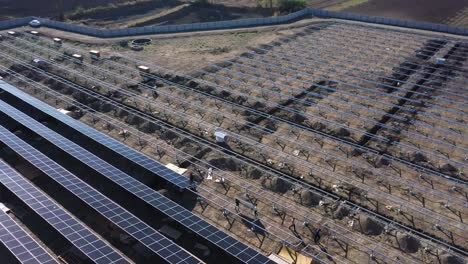 Aerial-drone-view-is-going-sideways-and-a-lot-of-people-are-going-to-get-massive-panels-and-a-lot-of-people-are-installing-solar-panels