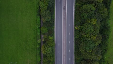 Bird's-Eye-View-Drone-Shot-of-Motorway-in-Countryside