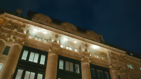 Top-of-a-building-on-Regent-Street-in-London-at-night-time