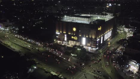 A-beautiful-nighttime-aerial-video-of-a-bustling-Chennai-City-close-to-Anna-Arch-Skyone-Mall