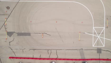 Bird-Eye-View-of-Motorcycle-Slalom-Through-Cones-in-Driver-Training-Area