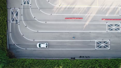 Aerial-View-of-Car-Driver-during-L-Turn-Test-Between-Cones