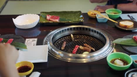 Japanese-Wagyu-Being-Cooked-at-Yakiniku-Restaurant,-Slow-Motion-4k-Shot