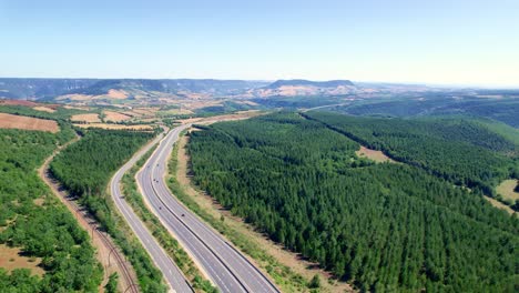 Highway-road-stretching-through-majestic-landscape-of-France-countryside