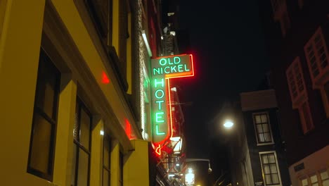 Nighttime-shot-of-entrance-neon-sign-of-the-old-Nickel-Hotel-in-Amsterdam