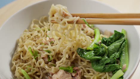Bakmi-wheat-based-noodles-derived-from-Chinese-cooking-tradition,-close-up