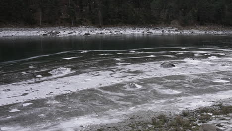 Partially-frozen-lake-in-the-Pyreneese-range-in-Andorra