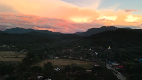 Beautiful-Sunset-in-Mueang-Khong-Chiang-Dao-Chiang-Mai-Pai-Mae-Hong-Son-Northern-Thailand,-Sunset-with-Birds-Village-and-Buddhist-Temple