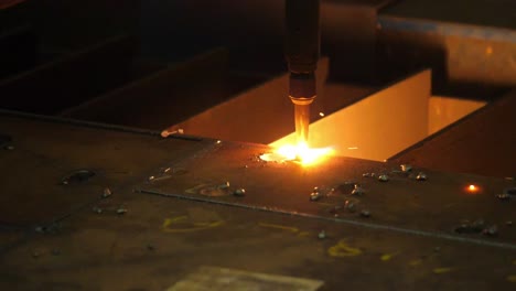 Laser-precision-at-work:-Watch-the-blaster-machine-effortlessly-cut-sheet-metal,-a-vivid-display-of-efficient-technology-in-this-stock-footage