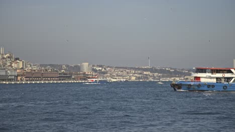 Sea-view-with-ships-passing-on-the-Bosphorus,-Istanbul-Turkiye