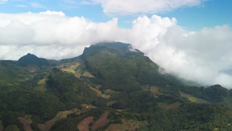 Doi-Nang-High-Altitude-Impressive-Mountain-Ridge-with-Remote-Farmland-in-Northern-Thailand-covered-in-Clouds,-Ban-Nong-Kha-Tae,-Chiang-Dao,-Chiang-Mai