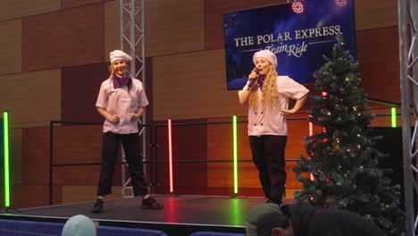 Female-actresses-perform-as-chefs-for-Polar-Express-train-ride-experience