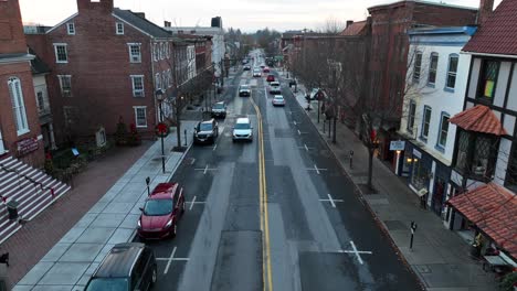 Establishing-drone-shot-of-traffic-on-road-in-American-city