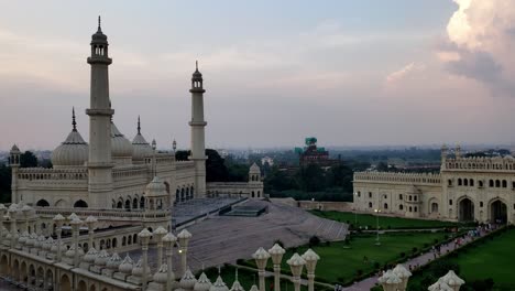 Lucknow-Bara-Imambara-Aerial-View,-Tourists-sightseeing-at-the-Bara-Imambara,-Entrance,-and-gardens-of-the-Asfi-mosque