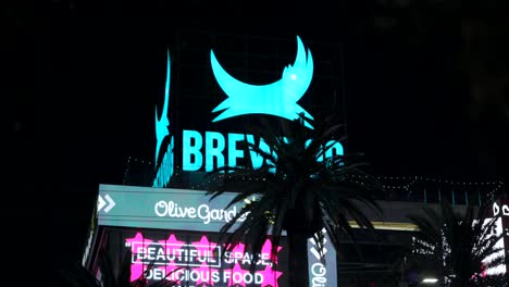 Neon-Business-Sign-Of-Brewdog-Bar-And-Restaurant-At-Night-In-Las-Vegas,-Nevada