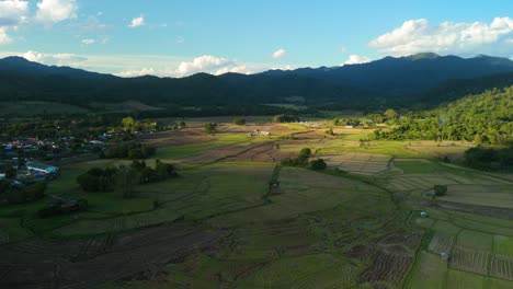 Last-Sunlight-of-the-Day-in-the-Beautiful-Mountain-Valley,-Mueang-Khong-Valley-in-the-Late-Afternoon-Sun,-Light-Shadow-Sun-Spot-and-Clouds,-Mountain-Rice-Fields-Agriculture-Land-and-Farming