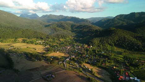 Mueang-Khong-with-Doi-Luang-Chiang-Dao-in-the-Background,-Small-Village-with-Ecotourism-Homestay-and-Coffee-Shops,-Small-Scenic-Village-with-Green-Mountain-Background