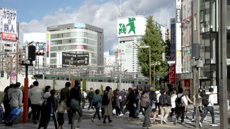 Scene-capturing-the-east-exit-at-Shinjuku-Station-in-Tokyo,-Japan