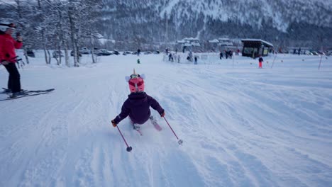 Young-girl-falling-when-skiing-in-Myrkdalen-Norway,-slow-motion