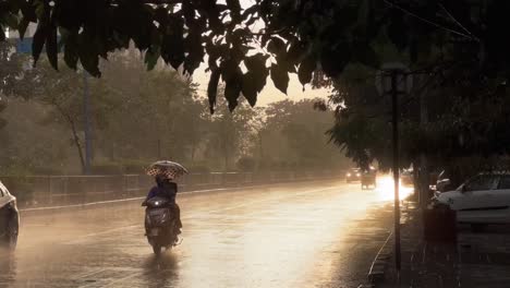 POV-SHOT-It's-raining-and-there-are-many-people-on-the-road,-many-people-on-many-bikes,-many-people-carrying-four-wheels