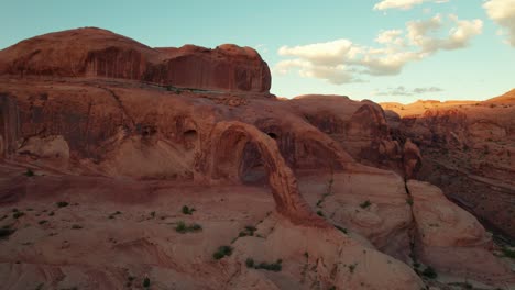 Close-panning-shot-to-the-left-of-Corona-Arch-at-golden-hour