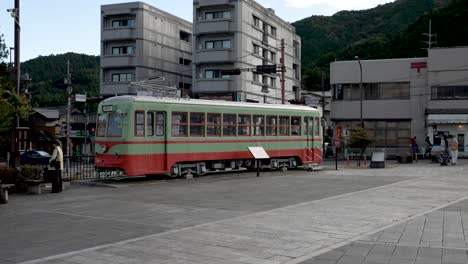 Retro-Tobu-Nikko-Series-100-Tram-Car-Outside-Station-In-Square