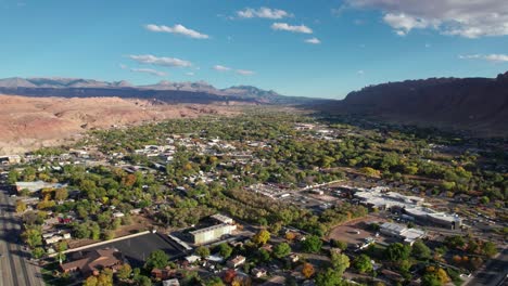 High-elevation-drone-shot-of-moab,-utah-on-a-sunny-day-in-the-fall